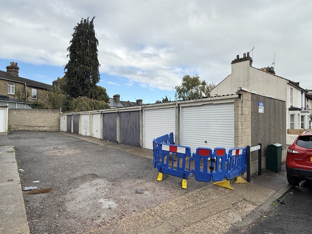 Lot: 5 - COMPOUND OF 27 GARAGES - Block of Nine Garages in Larger Compound